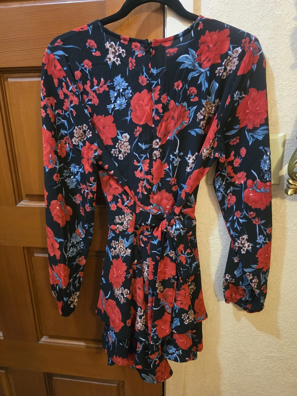 Black Floral Wrap Romper with Red & Blue Blooms